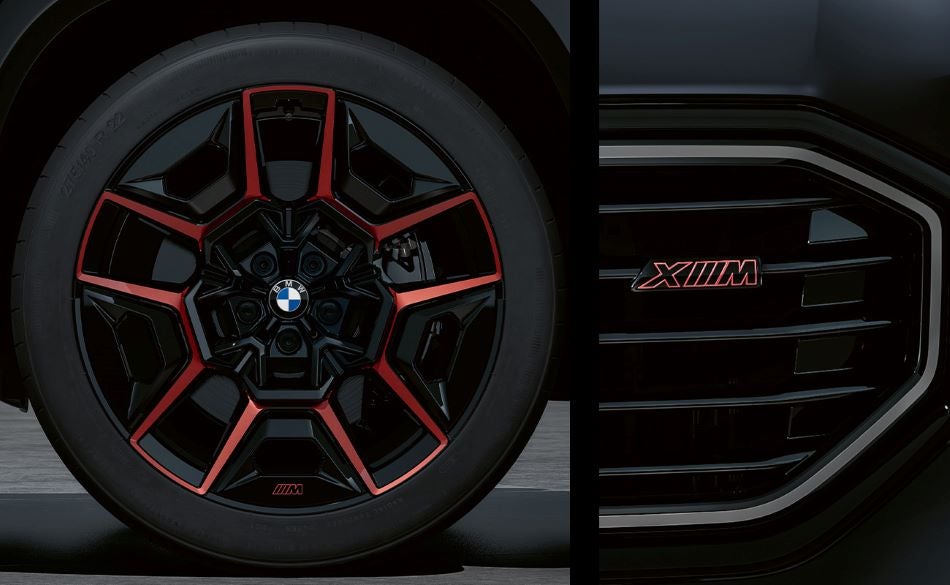 Detailed images of exclusive 22” M Wheels with red accents and XM badging on Illuminated Kidney Grille. in BMW of Palm Springs | Palm Springs CA