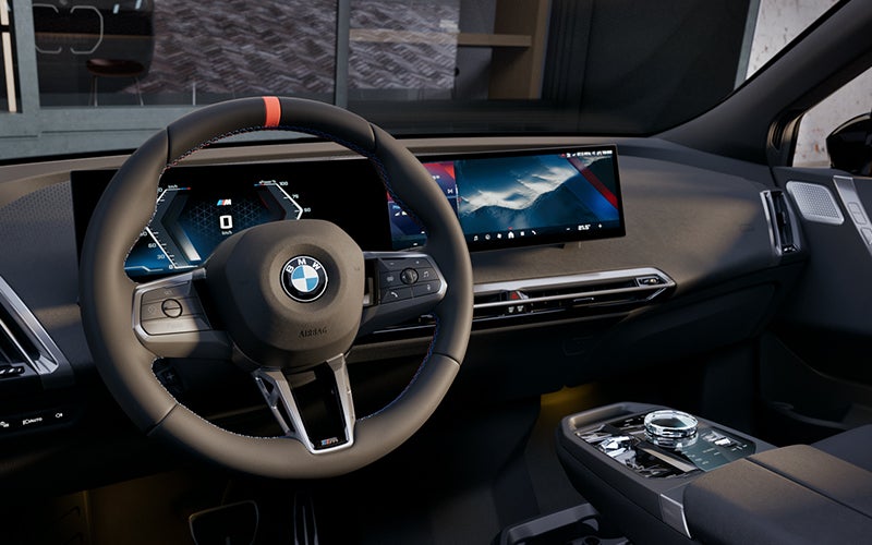 Interior steering wheel and dashboard of the BMW iX M70. | BMW of Palm Springs in Palm Springs CA