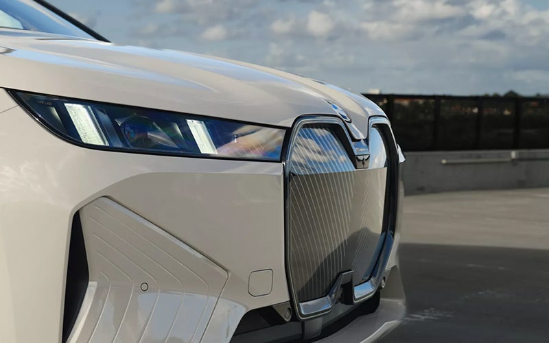 The BMW iX grille and headlight. | BMW of Palm Springs in Palm Springs CA
