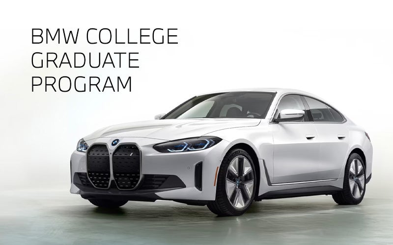 White BMW i4 parked. BMW College Graduate Program. | BMW of Palm Springs in Palm Springs CA