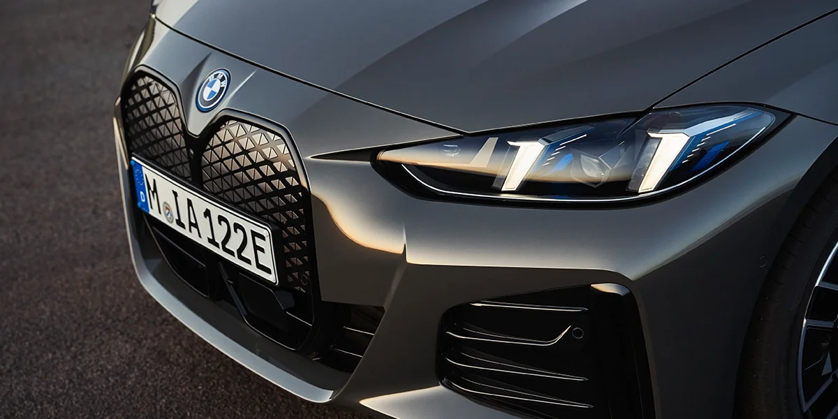 Artic race blue metallic 2026 BMW iX xdrive60 left front view in Palm Springs, CA