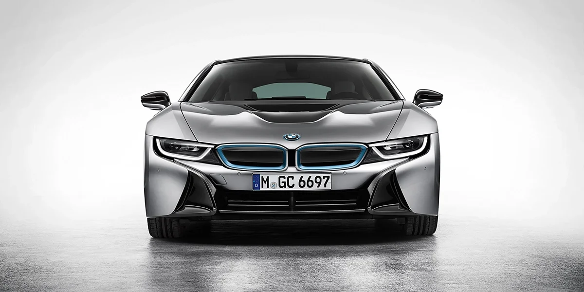 BMW i8 front view with aerodynamic grille, LED headlights, and sporty hybrid design